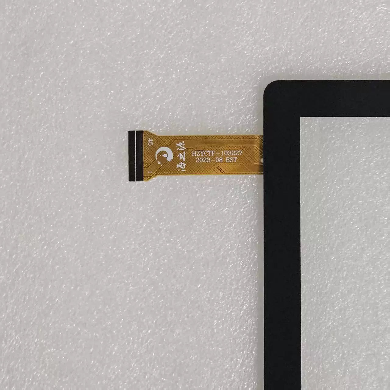 Close-up view of the internal flex cable for HZYCTP-103227 to verify the connector pins and hardware version