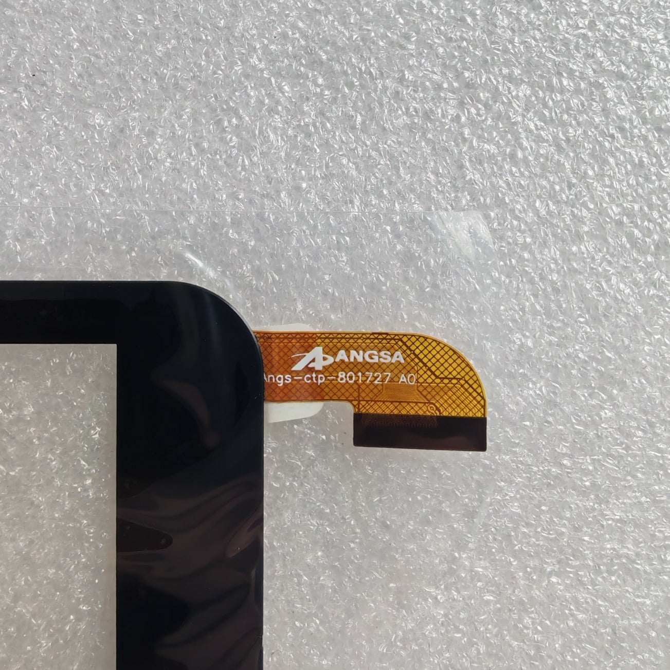 Close-up view of the internal flex cable showing the ANGS-CTP-801727 code to verify connector pins and hardware version