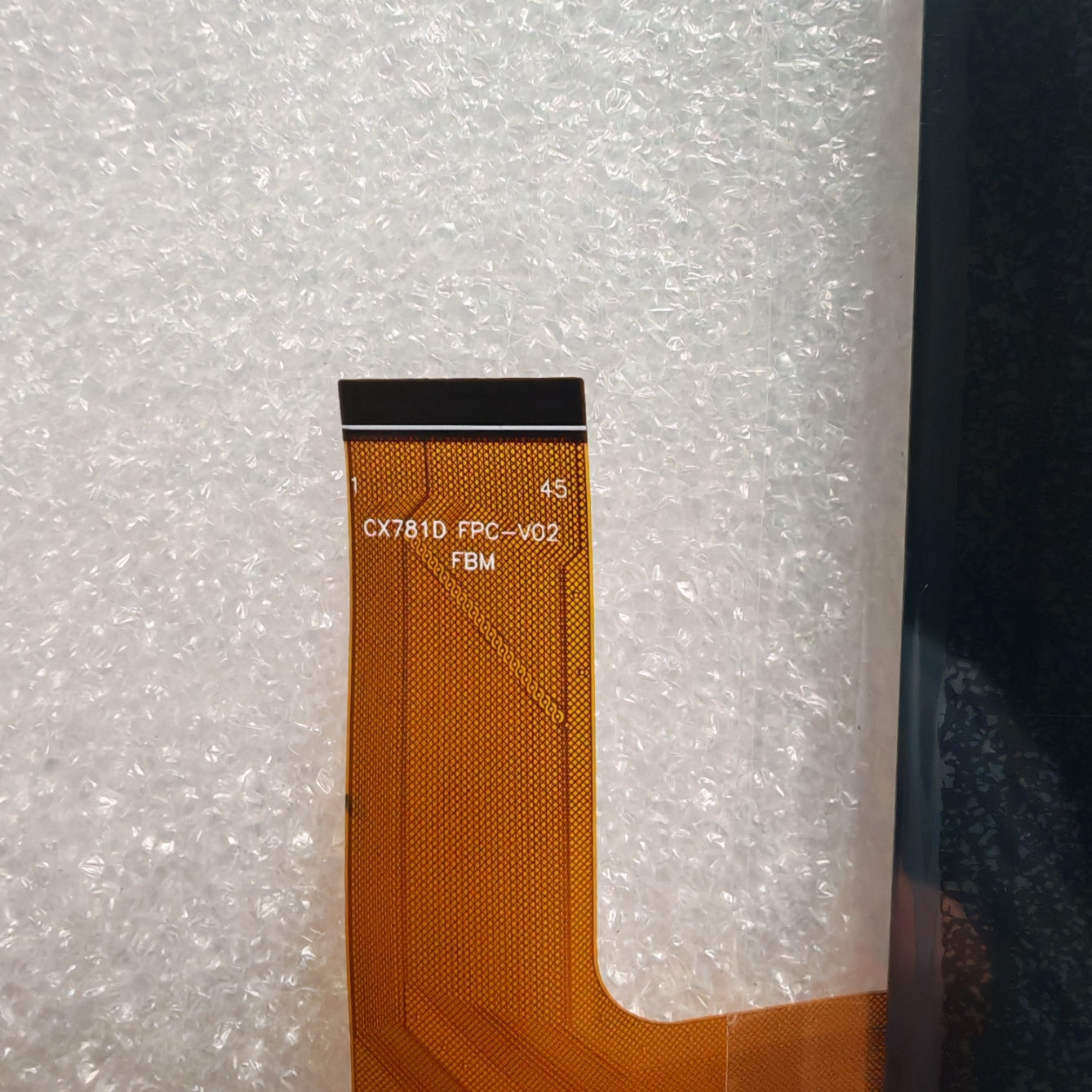 Close-up view of the internal flex cable for CX781D FPC-V02 to verify the connector pins and hardware version